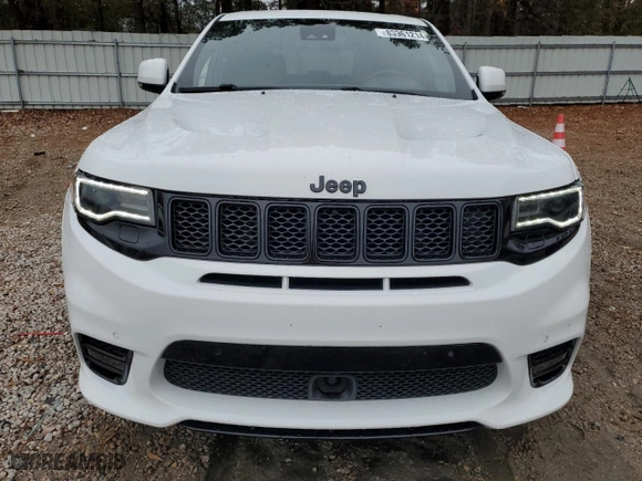 2021 Jeep Grand Cherokee SRT with VIN 1C4RJFDJ1MC561144, listed as a Copart auction lot 83961214 with 49,989 mi miles and Salvage Title. Bid and sale history available at carsss.com. Image 5.