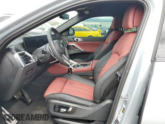 2025 BMW X6 M60i with VIN 5UX43EX06S9W68023, listed as a Copart auction lot 69874764 with 3,789 mi miles and Salvage Title. Bid and sale history available at carsss.com. Image 7.