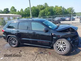 2018 Jeep Grand Cherokee Trailhawk with VIN 1C4RJFLG4JC241057, listed as a IAAI auction lot 42416590 with 81,822 mi miles and . Bid and sale history available at DreamBid. Image 13.