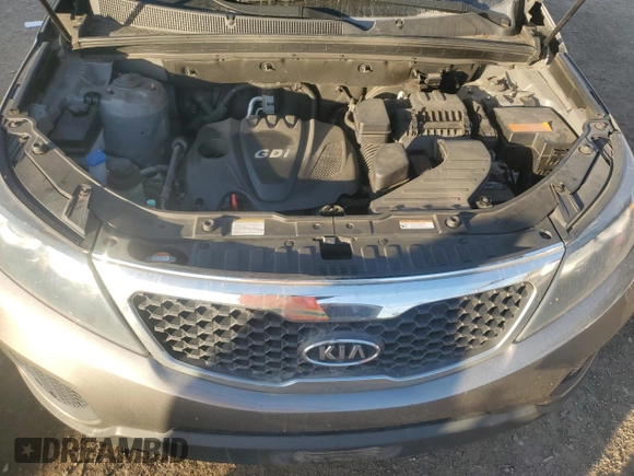 2012 Kia Sorento LX with VIN 5XYKTCA62CG255185, listed as a Copart auction lot 87242304 with 124,224 mi miles and Salvage Title. Bid and sale history available at DreamBid. Image 12.
