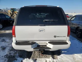 1999 Cadillac Escalade z VIN 1GYEK13R3XR406970, wystawiony jako Copart lot #87623365 z przebiegiem 189 339 mil mil oraz Szkoda całkowita • Salvage title. Historia ofert i sprzedaży dostępna na DreamBid. Obrazek 6.