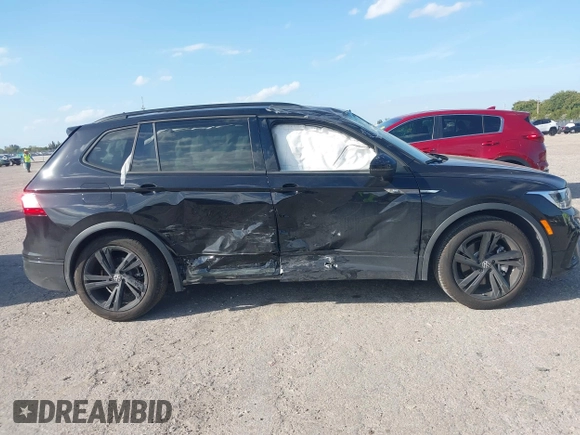 2024 Volkswagen Tiguan SE R-Line Black с VIN 3VVCB7AX7RM036985, выставлен на аукционе IAAI как лот 41709085 с пробегом 19 255 миль миль и . История ставок и продаж доступна на DreamBid. Изображение 14.