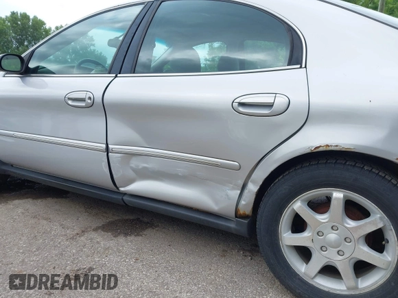 2002 Mercury Sable GS z VIN 1MEFM50U52G650143, wystawiony jako IAAI lot #42525337 z przebiegiem 151 079 mil mil oraz . Historia ofert i sprzedaży dostępna na DreamBid. Obrazek 6.