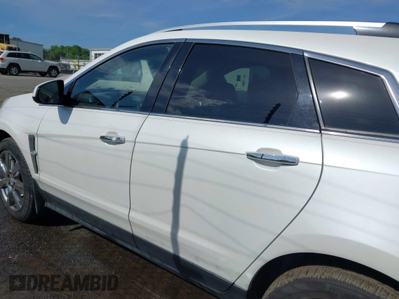 2012 Cadillac SRX Performance Collection с VIN 3GYFNBE30CS599466, выставлен на аукционе IAAI как лот 42053911 с пробегом 167 242 миль миль и . История ставок и продаж доступна на DreamBid. Изображение 14.