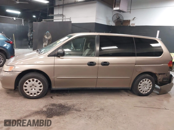 2004 Honda Odyssey LX with VIN 5FNRL18534B072936, listed as a IAAI auction lot 42366971 with 185,534 mi miles and . Bid and sale history available at DreamBid. Image 14.