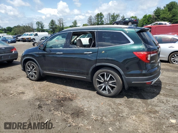 2020 Honda Pilot Touring 8-Passenger with VIN 5FNYF6H99LB053227, listed as a Copart auction lot 61302225 with 118,156 mi miles and Salvage title. Bid and sale history available at DreamBid. Image 2.