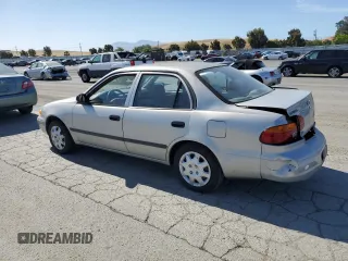 2002 Chevrolet Prizm z VIN 1Y1SK52862Z410699, wystawiony jako Copart lot #58118425 z przebiegiem 157 609 mil mil oraz Szkoda całkowita • Salvage title. Historia ofert i sprzedaży dostępna na DreamBid. Obrazek 2.