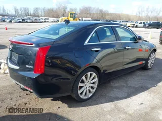 2014 Cadillac ATS Luxury AWD z VIN 1G6AH5RX7E0187421, wystawiony jako IAAI lot #41864984 z przebiegiem 102 927 mil mil oraz . Historia ofert i sprzedaży dostępna na DreamBid. Obrazek 4.