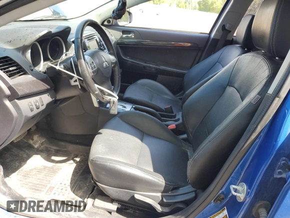 2016 Mitsubishi Lancer GT with VIN JA32U8FW6GU602331, listed as a Copart auction lot 62576735 with 128,454 mi miles and Salvage title. Bid and sale history available at DreamBid. Image 7.