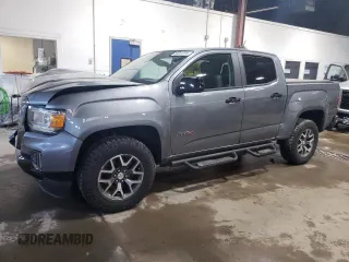 2021 GMC Canyon 4WD AT4 z VIN 1GTG6FEN1M1203936, wystawiony jako Copart lot #56041315 z przebiegiem 54 939 mil mil oraz Szkoda całkowita • Salvage title. Historia ofert i sprzedaży dostępna na DreamBid. Obrazek 1.