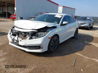 2020 Honda Civic LX z VIN 2HGFC2F68LH565560, wystawiony jako IAAI lot #41517853 z przebiegiem 96 832 mil mil oraz . Historia ofert i sprzedaży dostępna na DreamBid. Obrazek 17.