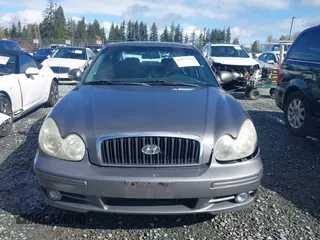 2004 Hyundai Sonata with VIN KMHWF25SX4A963868, listed as a IAAI auction lot 41973317 with 191,843 mi miles. Bid and sale history available at carsss.com. Image 12.