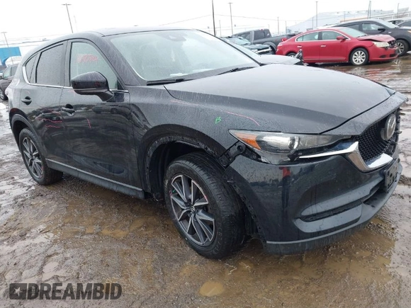 2018 Mazda CX-5 Touring with VIN JM3KFBCMXJ0450040, listed as a IAAI auction lot 41650824 with 83,133 mi miles. Bid and sale history available at carsss.com. Image 1.