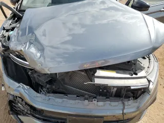 2022 Volkswagen Tiguan SE R-Line Black z VIN 3VV8B7AX7NM103911, wystawiony jako Copart lot #52364135 z przebiegiem 54 375 mil mil oraz Szkoda całkowita • Salvage title. Historia ofert i sprzedaży dostępna na DreamBid. Obrazek 14.