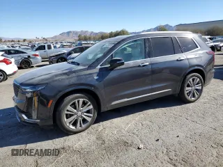 2022 Cadillac XT6 Premium Luxury with VIN 1GYKPCRS9NZ125022, listed as a Copart auction lot 42392485 with 34,703 mi miles and Salvage Title. Bid and sale history available at carsss.com. Image 1.