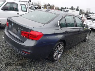 2018 BMW 3 Series 330i xDrive with VIN WBA8D9G56JNU72511, listed as a IAAI auction lot 41237501 with 40,734 mi miles. Bid and sale history available at carsss.com. Image 4.
