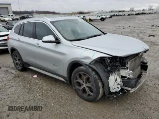 2017 BMW X1 sDrive28i with VIN WBXHU7C33H5H34013, listed as a Copart auction lot 38409444 with 87,558 mi miles and Salvage Title. Bid and sale history available at carsss.com. Image 4.