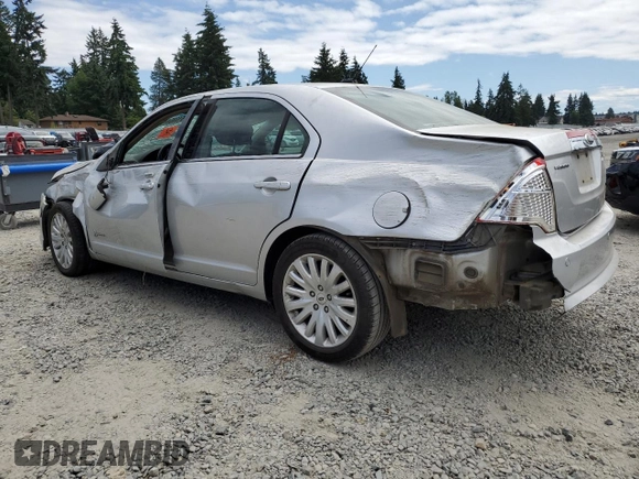 2012 Ford Fusion Hybrid с VIN 3FADP0L30CR284761, выставлен на аукционе Copart как лот 61286445 с пробегом 171 073 миль миль и Списание • Salvage title. История ставок и продаж доступна на DreamBid. Изображение 2.
