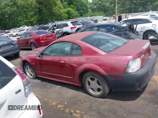 2003 Ford Mustang Standard z VIN 1FAFP40473F441647, wystawiony jako IAAI lot #42179189 z przebiegiem 138 460 mil mil oraz . Historia ofert i sprzedaży dostępna na DreamBid. Obrazek 14.