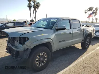 2023 Toyota Tacoma SR with VIN 3TMCZ5AN2PM564332, listed as a Copart auction lot 56237625 with 82,789 mi miles and Salvage title. Bid and sale history available at DreamBid. Image 1.