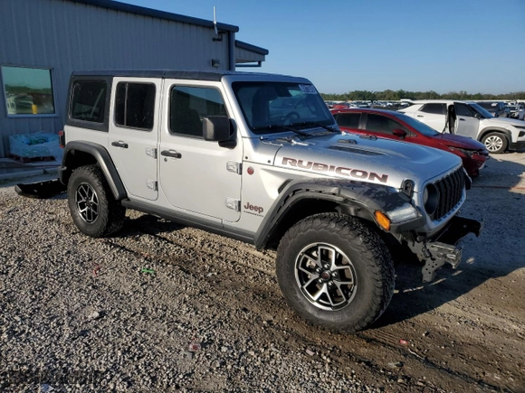 2024 Jeep Wrangler Rubicon with VIN 1C4PJXFG6RW310723, listed as a Copart auction lot 49173045 with 23,510 mi miles and Clean Title. Bid and sale history available at carsss.com. Image 4.