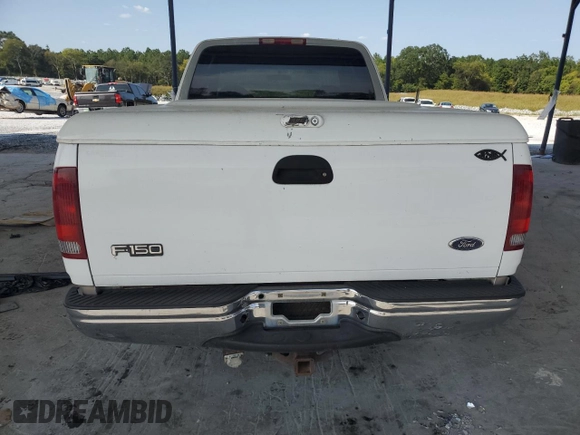 1998 Ford F-150 XL with VIN 1FTRX17L8WNA36541, listed as a Copart auction lot 70861344 with 266,137 mi miles and Salvage title. Bid and sale history available at DreamBid. Image 6.