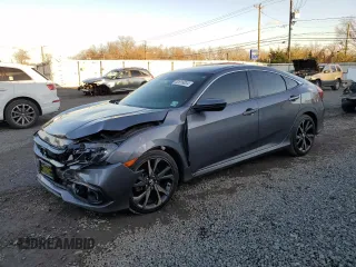 2019 Honda Civic Sport with VIN 2HGFC2F84KH507235, listed as a Copart auction lot 82616034 with 95,751 mi miles and Salvage title. Bid and sale history available at DreamBid. Image 1.