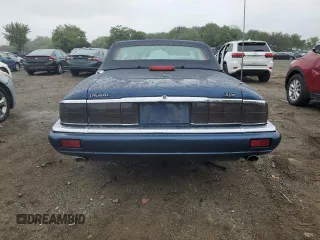 1995 Jaguar XJS with VIN SAJNX2741SC198516, listed as a Copart auction lot 69795314 with 75,227 mi miles and Salvage Title. Bid and sale history available at carsss.com. Image 6.