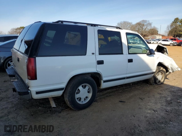 1999 GMC Yukon with VIN 1GKEC13R0XJ811710, listed as a Copart auction lot 43014995 with 311,948 mi miles and Salvage Title. Bid and sale history available at carsss.com. Image 3.