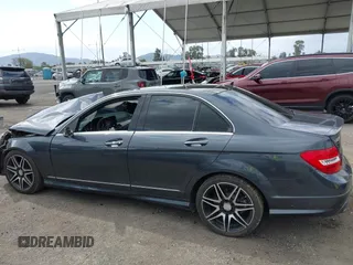 2014 Mercedes-Benz C C 250 Sport with VIN WDDGF4HB6ER317333, listed as a IAAI auction lot 42127437 with 128,010 mi miles. Bid and sale history available at carsss.com. Image 15.