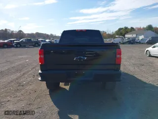 2017 Chevrolet Silverado 1500 LT with VIN 1GCVKREC0HZ293560, listed as a IAAI auction lot 40706331 with 133,438 mi miles. Bid and sale history available at carsss.com. Image 16.