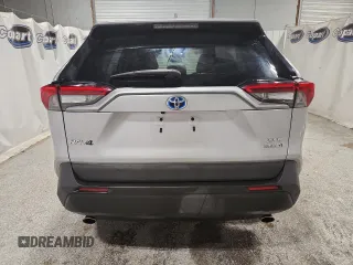 2022 Toyota RAV4 Hybrid XLE Premium with VIN 4T3B6RFV1NU080099, listed as a Copart auction lot 60206905 with 59,859 mi miles and Clean title. Bid and sale history available at DreamBid. Image 6.