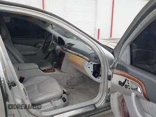2002 Mercedes-Benz S-Class 5.0L with VIN WDBNG75J12A246997, listed as a IAAI auction lot 41566423 with 181,940 mi miles. Bid and sale history available at carsss.com. Image 5.