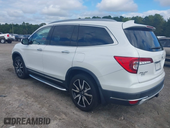 2020 Honda Pilot Elite with VIN 5FNYF6H08LB014288, listed as a IAAI auction lot 40496871 with 57,921 mi miles and . Bid and sale history available at DreamBid. Image 3.
