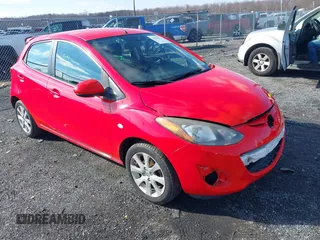 2012 Mazda 2 Touring z VIN JM1DE1LZ2C0152367, wystawiony jako IAAI lot #41526817 z przebiegiem 52 011 mil mil oraz . Historia ofert i sprzedaży dostępna na DreamBid. Obrazek 1.