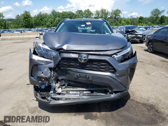 2023 Toyota RAV4 XLE with VIN 2T3P1RFV0PC331350, listed as a Copart auction lot 61234355 with 27,962 mi miles and Salvage title. Bid and sale history available at DreamBid. Image 5.