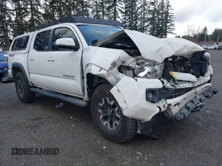 2018 Toyota Tacoma SR with VIN 3TMCZ5AN4JM177210, listed as a IAAI auction lot 41766229 with 64,767 mi miles. Bid and sale history available at carsss.com. Image 1.