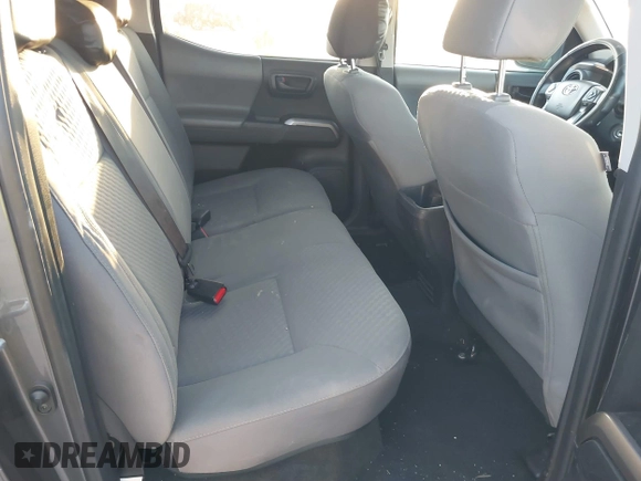 2021 Toyota Tacoma SR z VIN 3TYAX5GN2MT020997, wystawiony jako IAAI lot #40991578 z przebiegiem 81 509 mil mil oraz . Historia ofert i sprzedaży dostępna na DreamBid. Obrazek 8.
