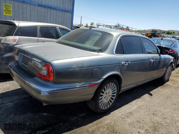 2006 Jaguar XJ Vanden Plas with VIN SAJWA82BX6SH09069, listed as a Copart auction lot 68122604 with 153,999 mi miles and Salvage Title. Bid and sale history available at carsss.com. Image 3.