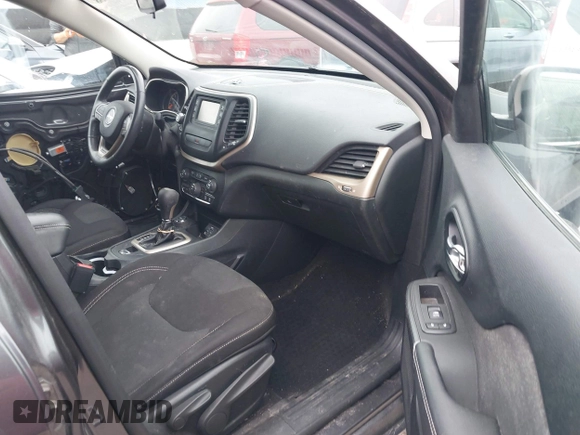 2015 Jeep Cherokee Latitude z VIN 1C4PJMCS1FW512422, wystawiony jako IAAI lot #42365358 z przebiegiem 139 521 mil mil oraz . Historia ofert i sprzedaży dostępna na DreamBid. Obrazek 5.