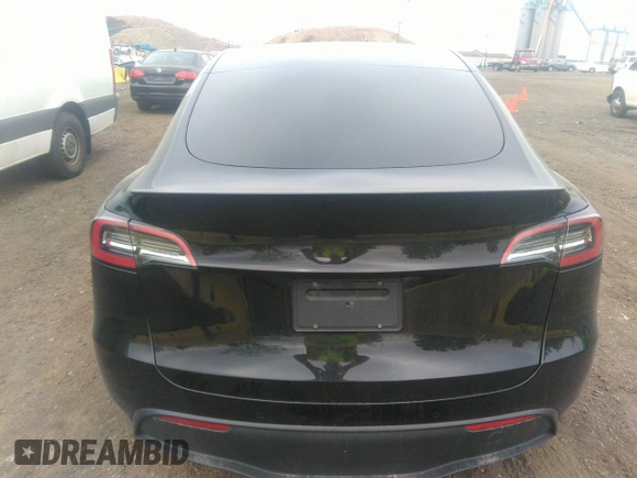 2022 Tesla Model Y Performance with VIN 7SAYGDEF6NF530388, listed as a IAAI auction lot 39253462 with 21,393 mi miles and . Bid and sale history available at DreamBid. Image 15.