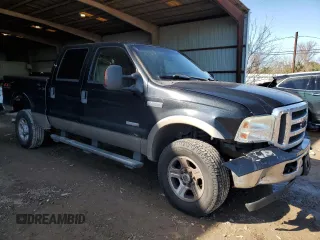 2005 Ford F-350 XL with VIN 1FTWW31PX5EC32346, listed as a Copart auction lot 88331015 with 154,075 mi miles and Salvage Title. Bid and sale history available at DreamBid. Image 1.