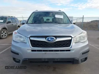 2016 Subaru Forester 2.5i Touring with VIN JF2SJAXC7GH455601, listed as a IAAI auction lot 41876613 with 133,976 mi miles. Bid and sale history available at carsss.com. Image 13.