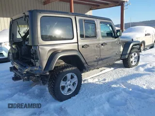 2022 Jeep Wrangler Unlimited Sport with VIN 1C4HJXDG5NW157317, listed as a IAAI auction lot 41374590 with 67,632 mi miles and . Bid and sale history available at DreamBid. Image 4.
