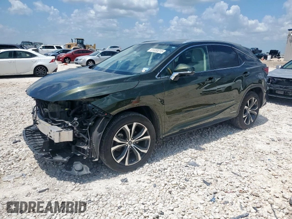 2020 Lexus RX 450h with VIN 2T2HGMDA3LC046646, listed as a Copart auction lot 61030015 with 74,709 mi miles and Salvage title. Bid and sale history available at DreamBid. Image 1.