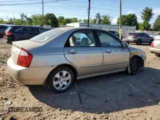 2006 Kia Spectra EX z VIN KNAFE121365269433, wystawiony jako Copart lot #56634735 z przebiegiem 86 551 mil mil oraz Szkoda całkowita • Salvage title. Historia ofert i sprzedaży dostępna na DreamBid. Obrazek 3.