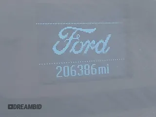 2017 Ford Transit with VIN 1FTYE1CM4HKB06427, listed as a IAAI auction lot 40597787 with 206,386 mi miles and . Bid and sale history available at DreamBid. Image 16.