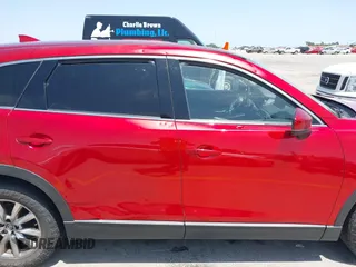 2018 Mazda CX-9 Touring with VIN JM3TCBCY6J0201556, listed as a IAAI auction lot 42285456 with 144,841 mi miles and . Bid and sale history available at DreamBid. Image 13.