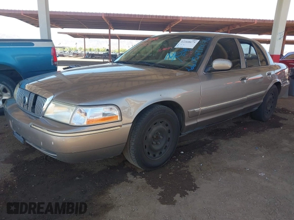 2004 Mercury Grand Marquis GS z VIN 2MEFM74W44X661154, wystawiony jako IAAI lot #42268675 z przebiegiem 236 456 mil mil oraz . Historia ofert i sprzedaży dostępna na DreamBid. Obrazek 2.