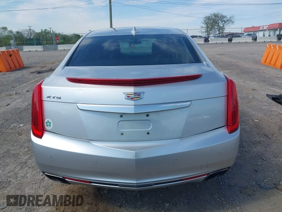 2016 Cadillac XTS Luxury Collection z VIN 2G61M5S33G9107107, wystawiony jako IAAI lot #42072608 z przebiegiem 130 542 mil mil oraz . Historia ofert i sprzedaży dostępna na DreamBid. Obrazek 16.